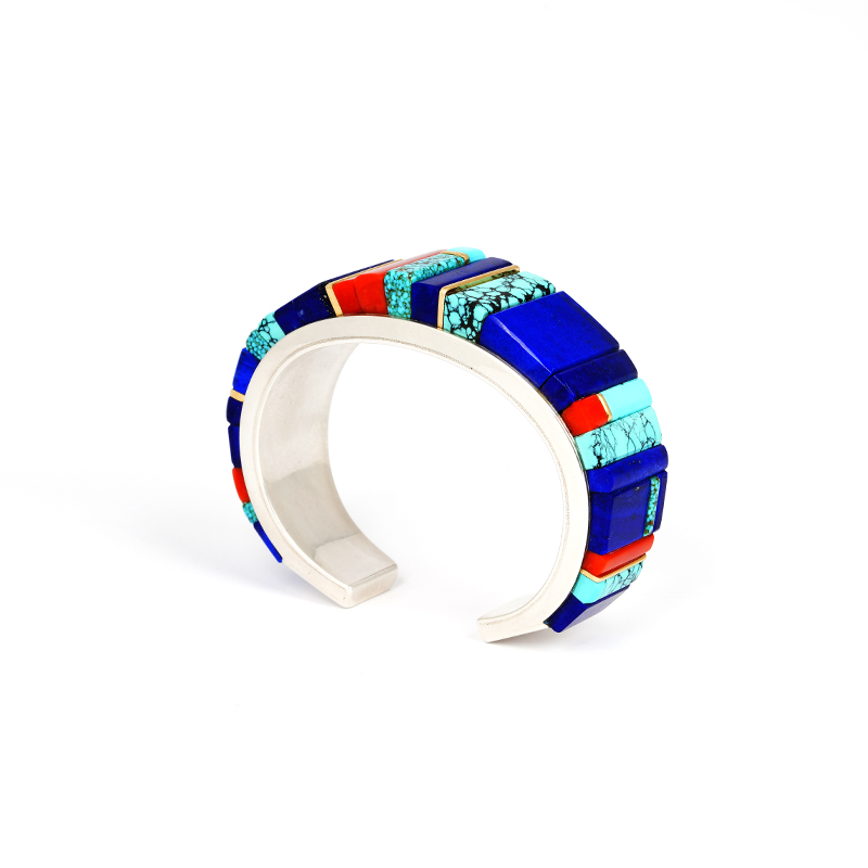 Silver Bracelet by Sonwai (Verma Nequatewa), featuring inlaid lapis, turquoise, coral, A bold expression of Hopi artistry and contemporary jewelry.